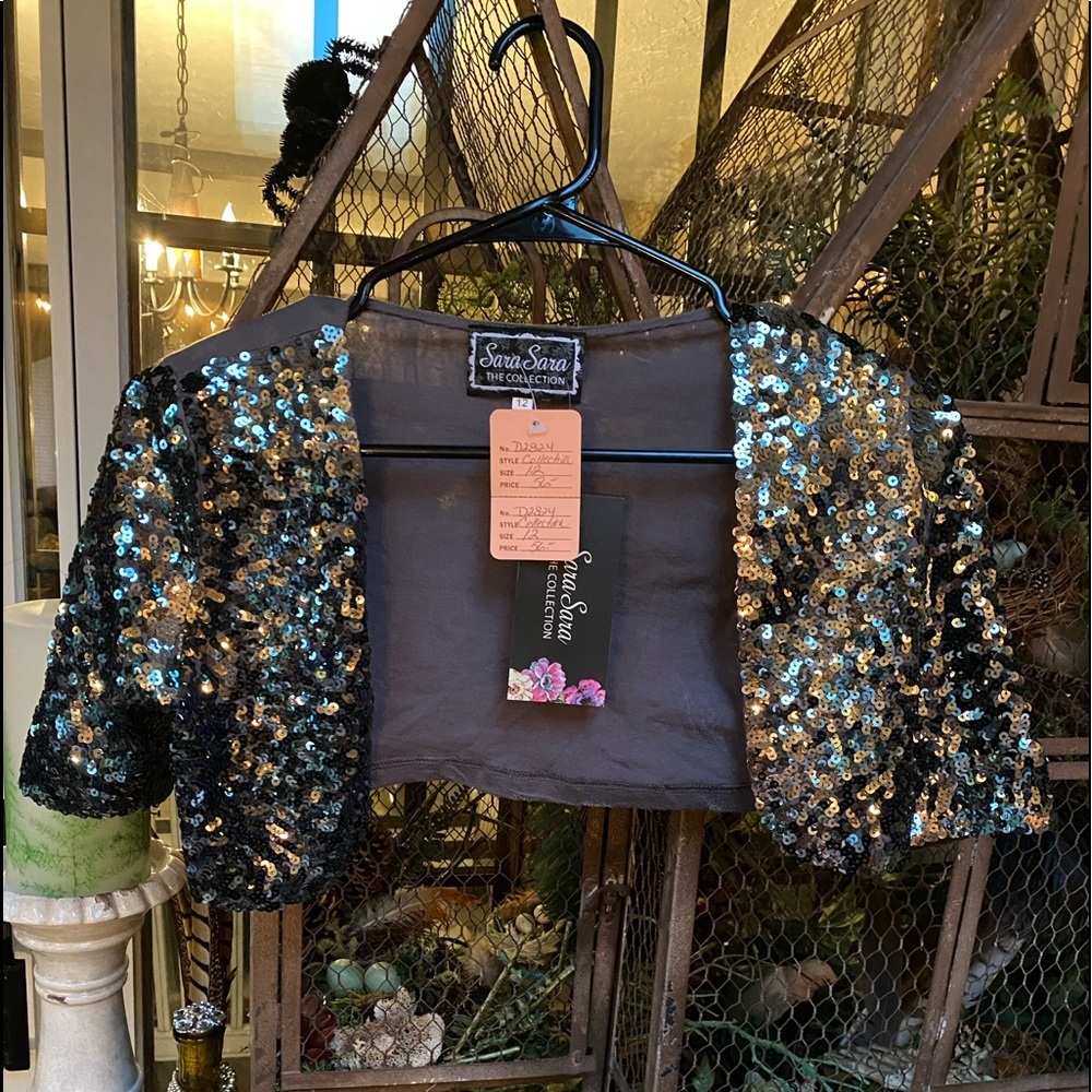 NWT Sara Sara sequins shrug 12 paid 56.00